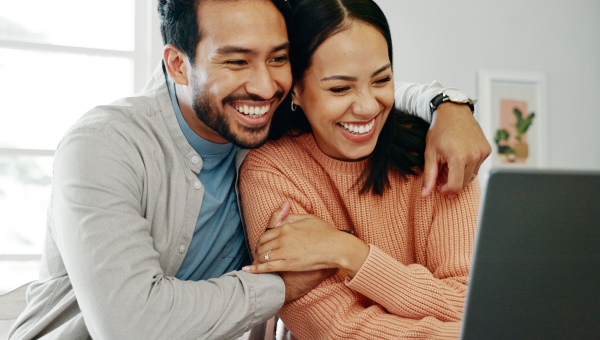 A happy couple celebrating Kingwood IVF milestones